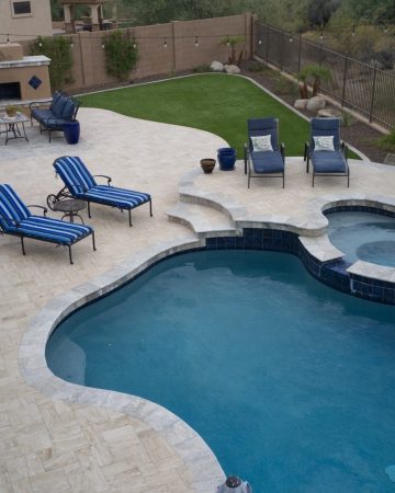 How to Integrate a Waterfall Feature into Your Pool Design