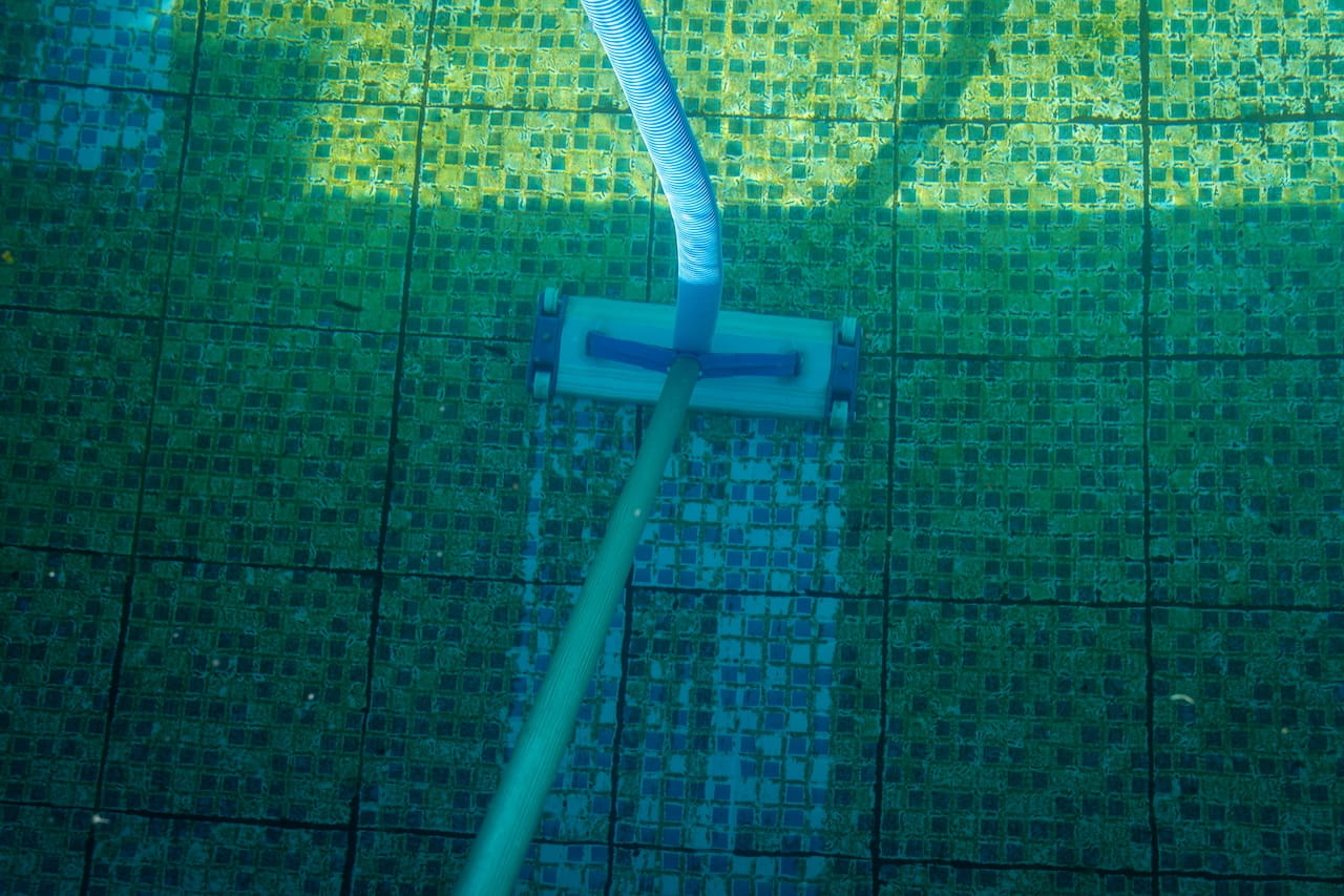 pool deep cleaning with an automatic motorized cleaner